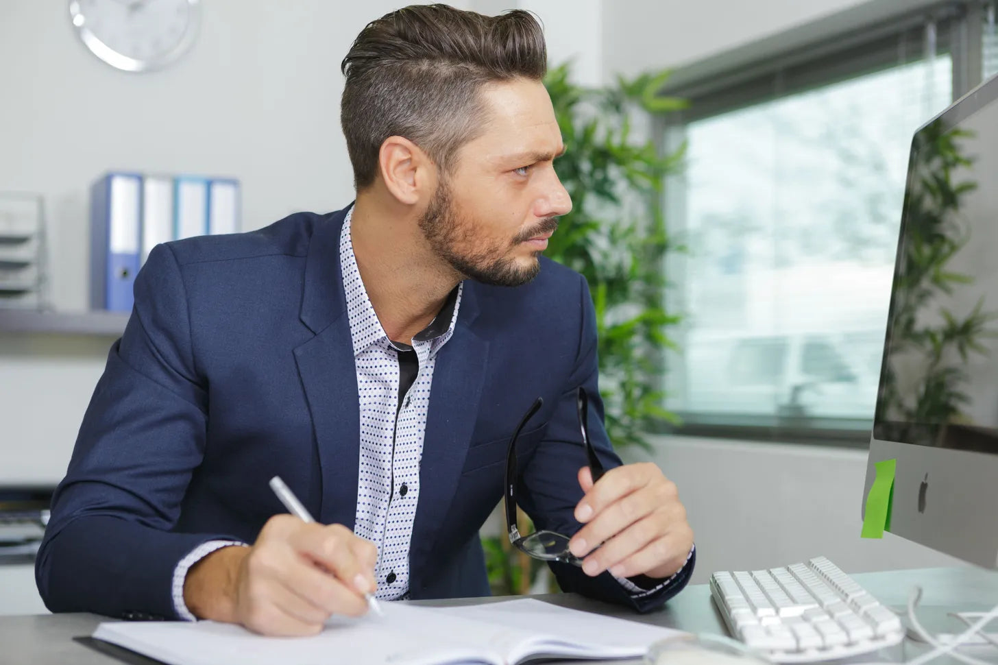 The course creator working with small business financial information